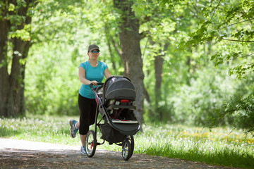 Young woman with a stroller
