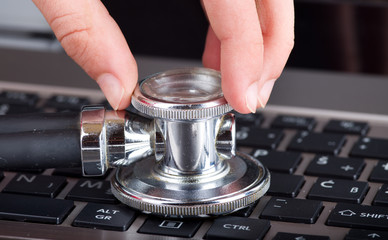 Stethoscope on laptop
