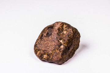 Large rock stone isolated on a white background.