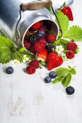 Fresh Berries on Wooden Background.