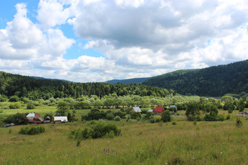 landscape with a village in Carpathian mountains
