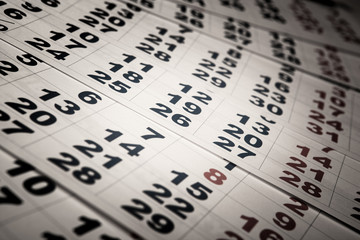 sheets of wall calendar with the number of days