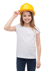smiling little girl in protective helmet