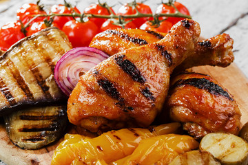 Grilled chicken drumstick with vegetables