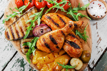 Grilled chicken drumstick with vegetables