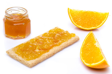 Orange, jam and a crisp toast