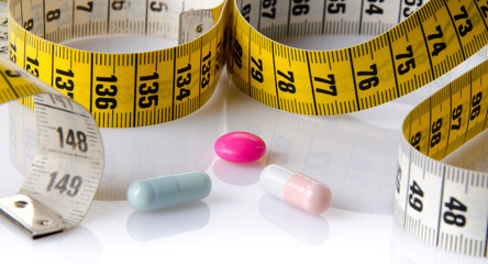 Measuring tape with pills