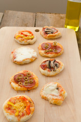Italian pizza with paprika, salami and olives