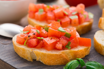 Italian bruschetta with tomatoes and basil