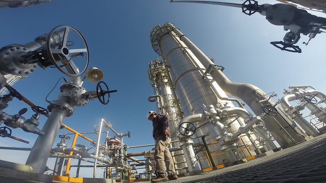 Engineer working in refining factory in summer season