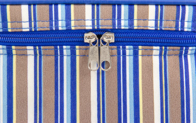 Closeup of zipper on fabric texture