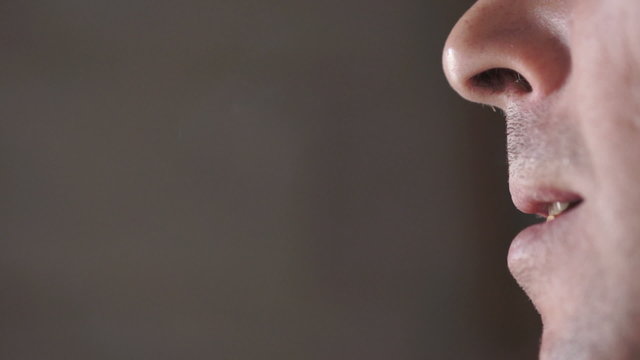 flipping cigarette in mouth Flipping Cigarette Into Mouth Failure Stock Video
