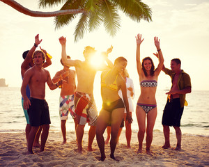 Diverse People Dancing and Partying on a Tropical Beach