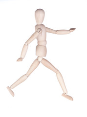 Wooden hinged dummy representing running person