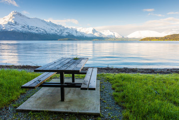 Picnic table at Lake Wakatipu in Queentown, New Zealand.