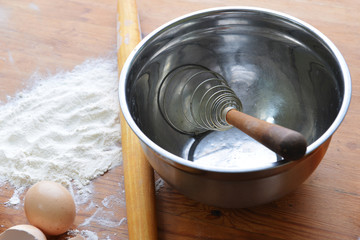flour on wooden background
