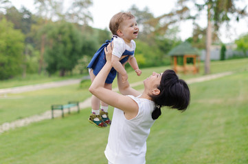 Fototapeta premium Girl in Mother's Arms