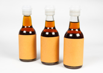 Glass Bottles with Liquid, Blank Label and Plastic Cap