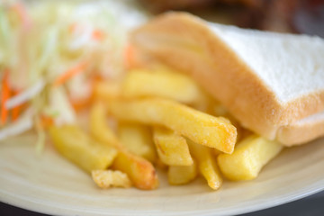 Fresh Breakfast slice of bread with french fire and salad