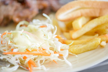 Grilled Pork  steak with french fires ,salad and bread