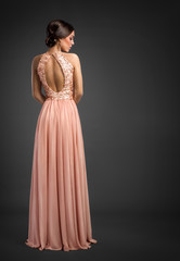 Elegant fashion  lady in evening dress