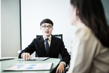 Successful young business executives meeting at the office