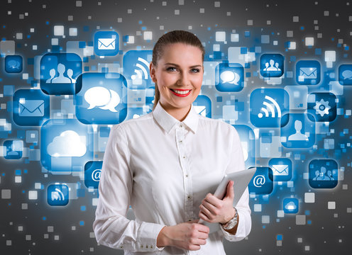 Smiling businesswoman over technology background