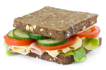 Super healthy salad , cheese and ham sandwich on dark bread