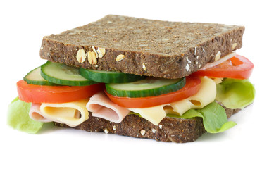 Super healthy salad , cheese and ham sandwich on dark bread