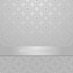 Invitation card with silver elements of design