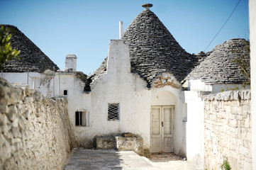 Fototapeta na wymiar Typical trulli houses in Alberobello, Italy