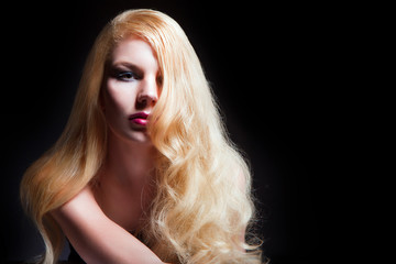 portrait of a beautiful girl with long white hairs.