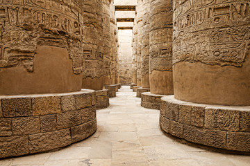 Close up of columns covered in hieroglyphics, Karnak, Egypt.