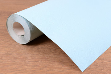 Wallpaper on wooden floor