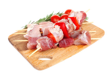 Raw pork kebab isolated on white
