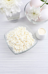 Tasty dairy products on wooden table