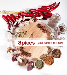 Poster Different spices and cutting board, isolated on white © Africa Studio