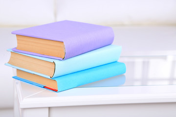 Books on coffee table in room
