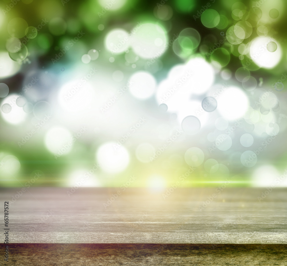 Wall mural empty table and green spring background