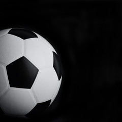 soccer ball on black background