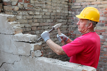 Construction site, worker demolish old building, chisel, hammer
