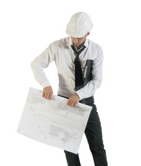 Young handsome contractor rolling up plans isolated on white