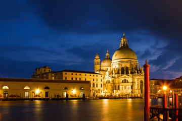 Fototapeta na wymiar Evening view on the Venetian church - St. Maria della Salute
