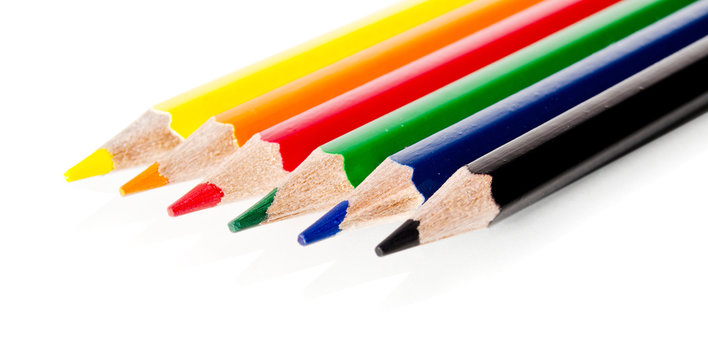 Beautiful multi-colored pencils isolated on white background