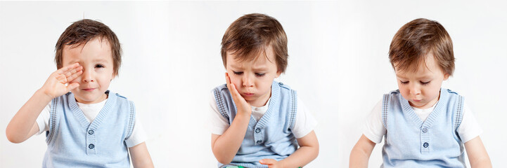 Boy, making funny faces on a white background