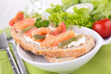bruschetta with salmon and salad