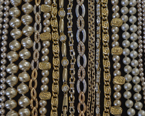 variety of golden jewelery closeup