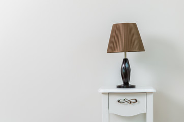 Lamp on bedside table
