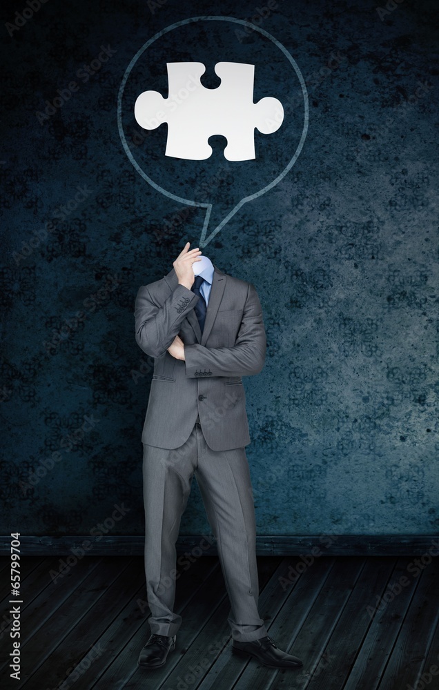 Aufkleber composite image of headless businessman with jigsaw in speech bu