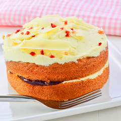 White chocolate jam and cream sponge cake